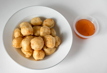Thai food, deep fried shrimp balls on a white background