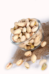 pistachio in bowl, pistachio on jute