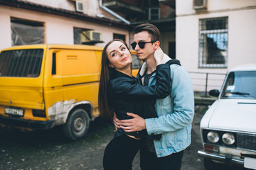 Fototapeta na wymiar Youth and fashionable couple on the streets.