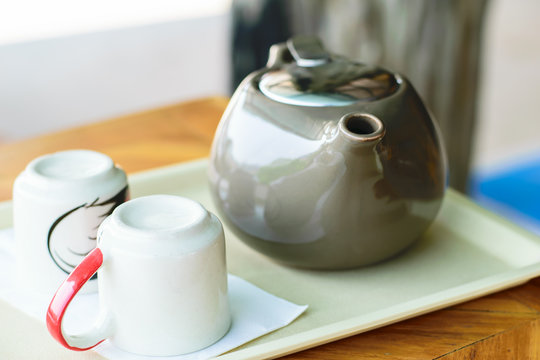  tea cup and tea pot