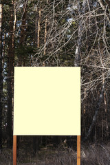 Old blank signboard in the woods
