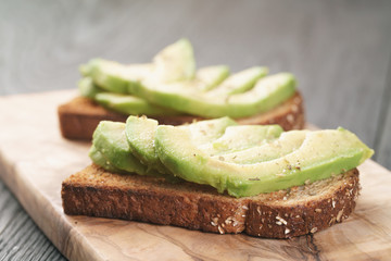 open sandwiches with avocado and spices, shallow focus