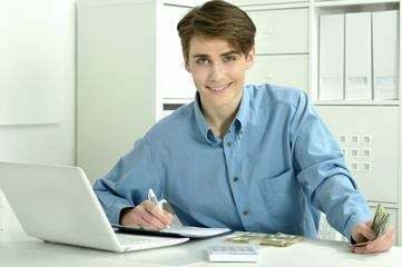 Fototapeta premium businessman working with laptop in office
