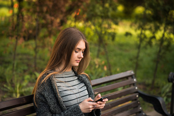 Obraz premium cute girl speaks by phone