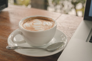 coffee latte art on the table.