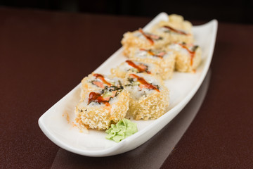 sushi rolls on white plate