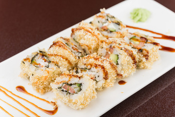 sushi rolls on white plate