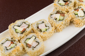 sushi rolls on white plate