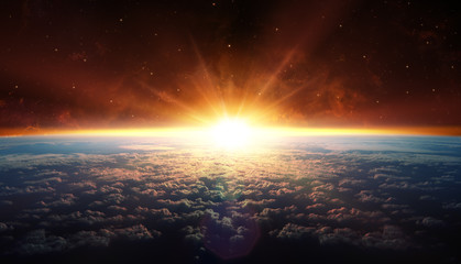 Obraz premium Zachód słońca na orbicie