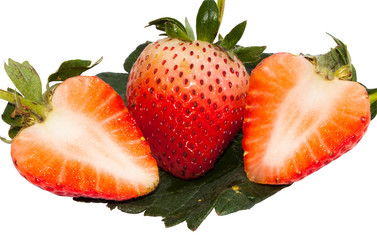 Macro two Red Strawberry on strawberry leaf