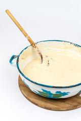 Mixed dough in the metal bowl