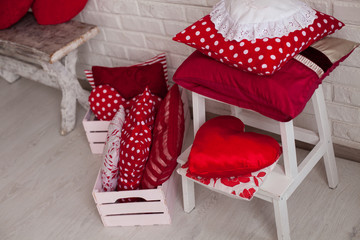 Different red and white pillows