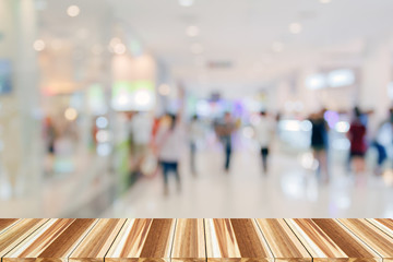 Perspective wood and Empty top wooden shelves of supermarket/mal