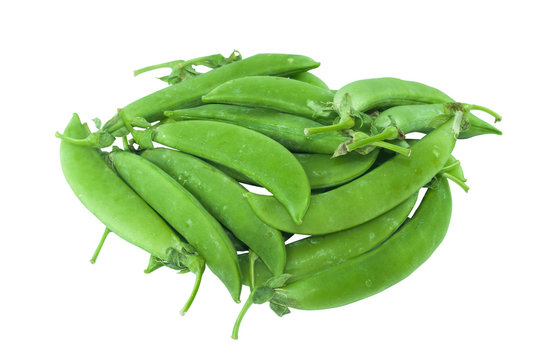 Closeup green peas on white background