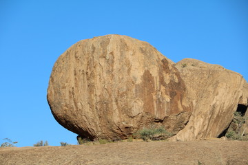 Giant Granite Boulder under blue sky at Bull's Party in Namibia, Erongo Mountains Africa