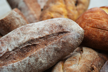 Loaves of Home Baked Leavened Bread made of wheat and buckwheat flour, raisins, tumeric using an antique recipe