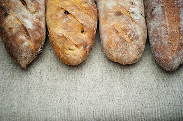 Loaves of Home Baked Leavened Bread made of wheat and buckwheat flour, raisins, tumeric using an antique recipe