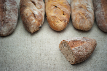 Loaves of Home Baked Leavened Bread made of wheat and buckwheat flour, raisins, tumeric using an antique recipe