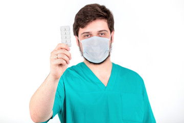 Doctor man holding tablet on white background.
