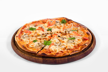 Pizza on a wood plate on a white background