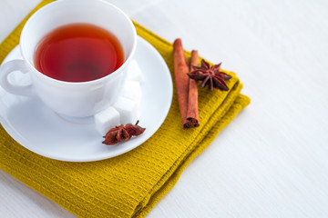 cup of tea with teaspoon