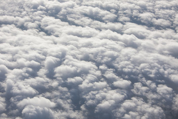 Obraz na płótnie Canvas Flying above the clouds