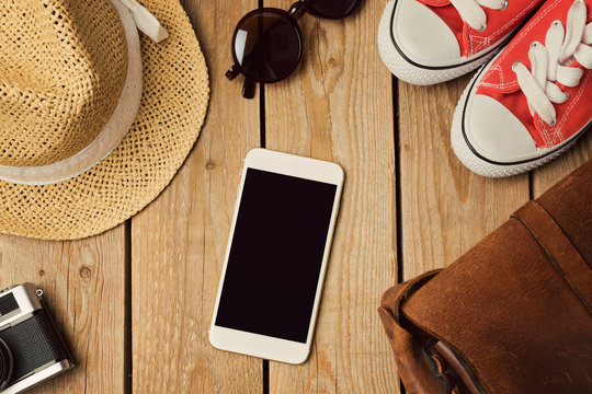 Smartphone mock up template with hipster fashion objects. View from above. Flat lay