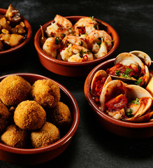 Traditional Spanish fried seafood and tapas - obrazy, fototapety, plakaty