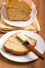 Cinnamon bread, sliced with butter