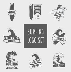 Fototapeta premium Surfing labels, badges and design elements with surfer, wave and surfboard.