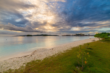 Scenic sunset on the beach, Togian Islands, Indonesia