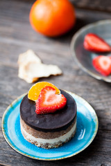Raw vegan cake with chocolate on top