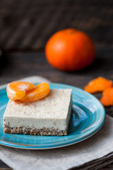 Raw vegan cheese cake with oranges