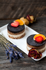 Raw vegan cake with chocolate on top