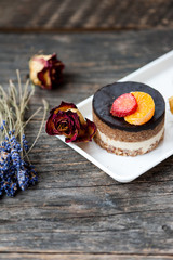 Raw vegan cake with chocolate on top