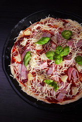 Pizza Hawaii with ham and pineapple