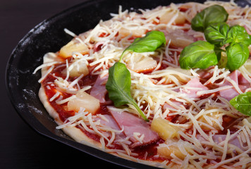 Pizza Hawaii with ham and pineapple