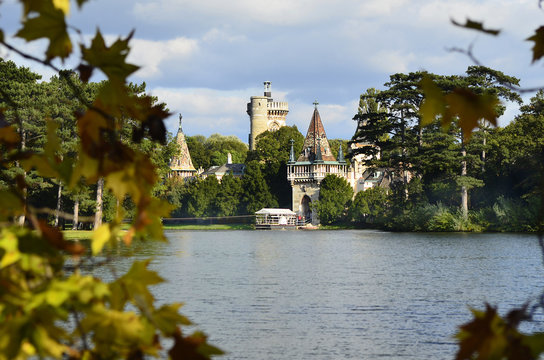 Austria, Castle Franzensburg with lake and ferry boat