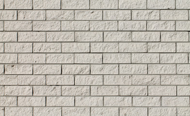 White - light gray roguh brick wall background