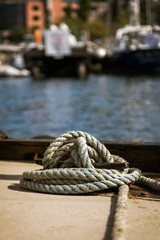 Fototapeta na wymiar Coiled rope at a marina on Lake Union in Seattle.