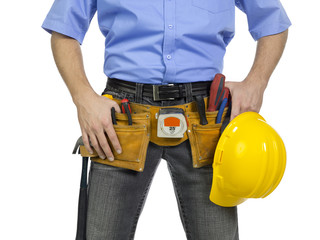 mid section of a man with tool belt and hard hat.