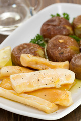 octopus with potato on white dish