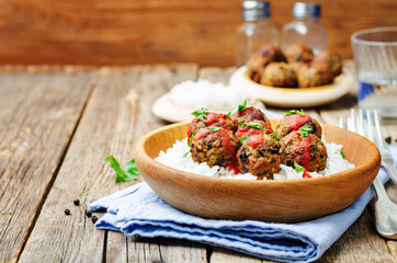 Eggplant white beans vegan meatballs with tomato sauce and rice