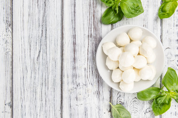 Mozzarella (on wooden background) © HandmadePictures
