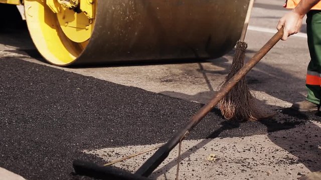 Heavy Vibration roller compactor at asphalt pavement works for road repairing