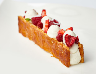 Milfey. dessert of puff pastry, vanilla cream and fruits