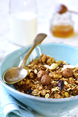 Homemade granola in a blue bowl .Top view.
