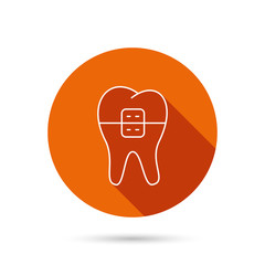 Dental braces icon. Tooth healthcare sign.