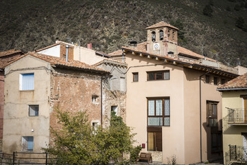 Fototapeta na wymiar buildings and the church in Noguera de Albarracin, Teruel, Spain