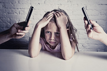 hands of network addict parents using mobile phone neglecting little sad ignored daughter bored